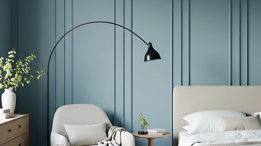 Scandinavian bedroom with white boucle furniture and warm, pale blue walls